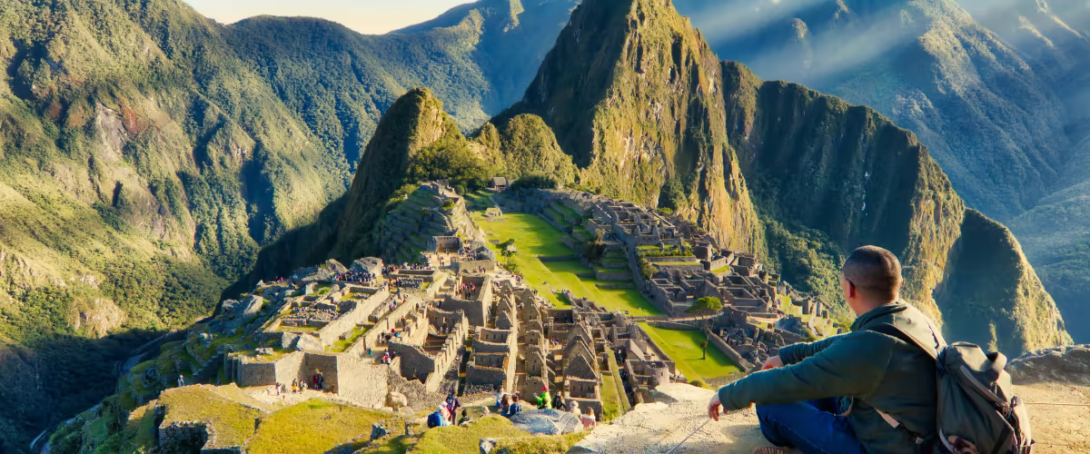 Machu Picchu with a person observing